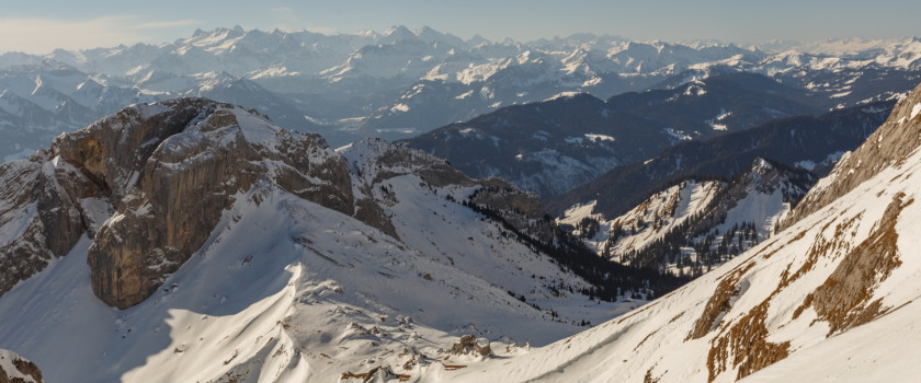 Snowy mountaintops in the sunlight