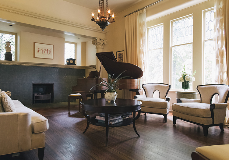 Common area with a piano in Stonehurst Place in Atlanta, Georgia
