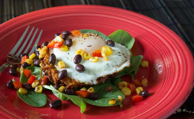 Basted Eggs Over Sweet Potato Hash Browns recipe from Wolf Cove Inn