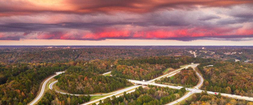 Overhead view of highways and a sunset